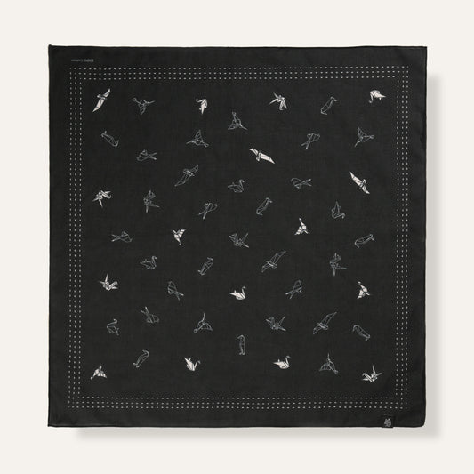 Black bandana with white geometric pattern on a white background