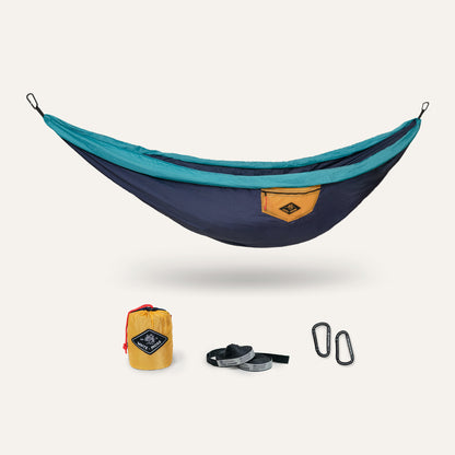 Navy and teal hammock with accessories on a white background