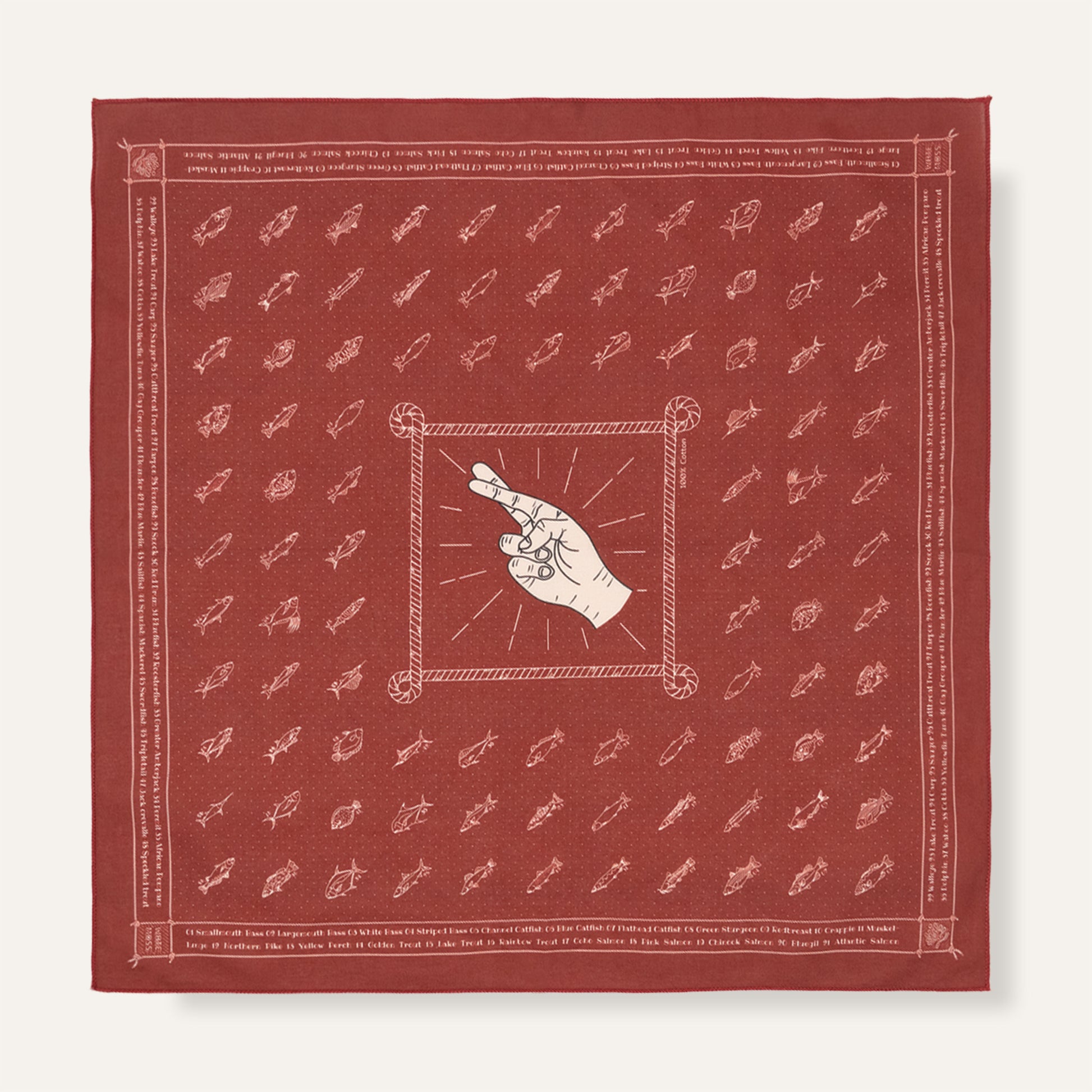 Red bandana with white patterns and central design on a white background