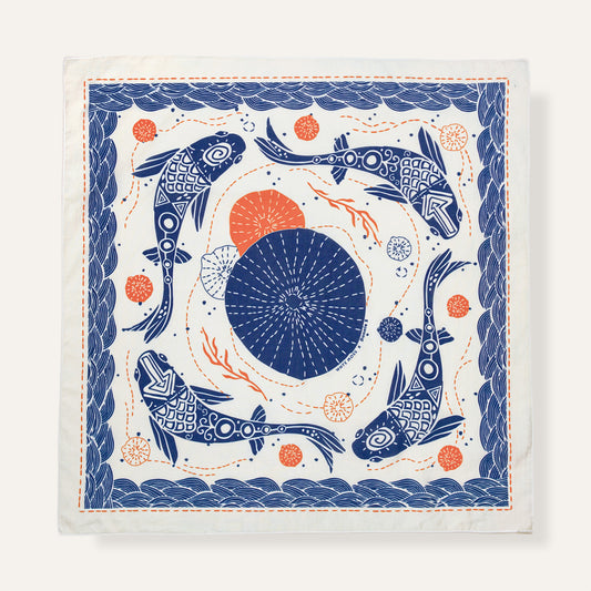 Cotton bandana with blue koi fish, geometric patterns, and orange accents on white fabric.