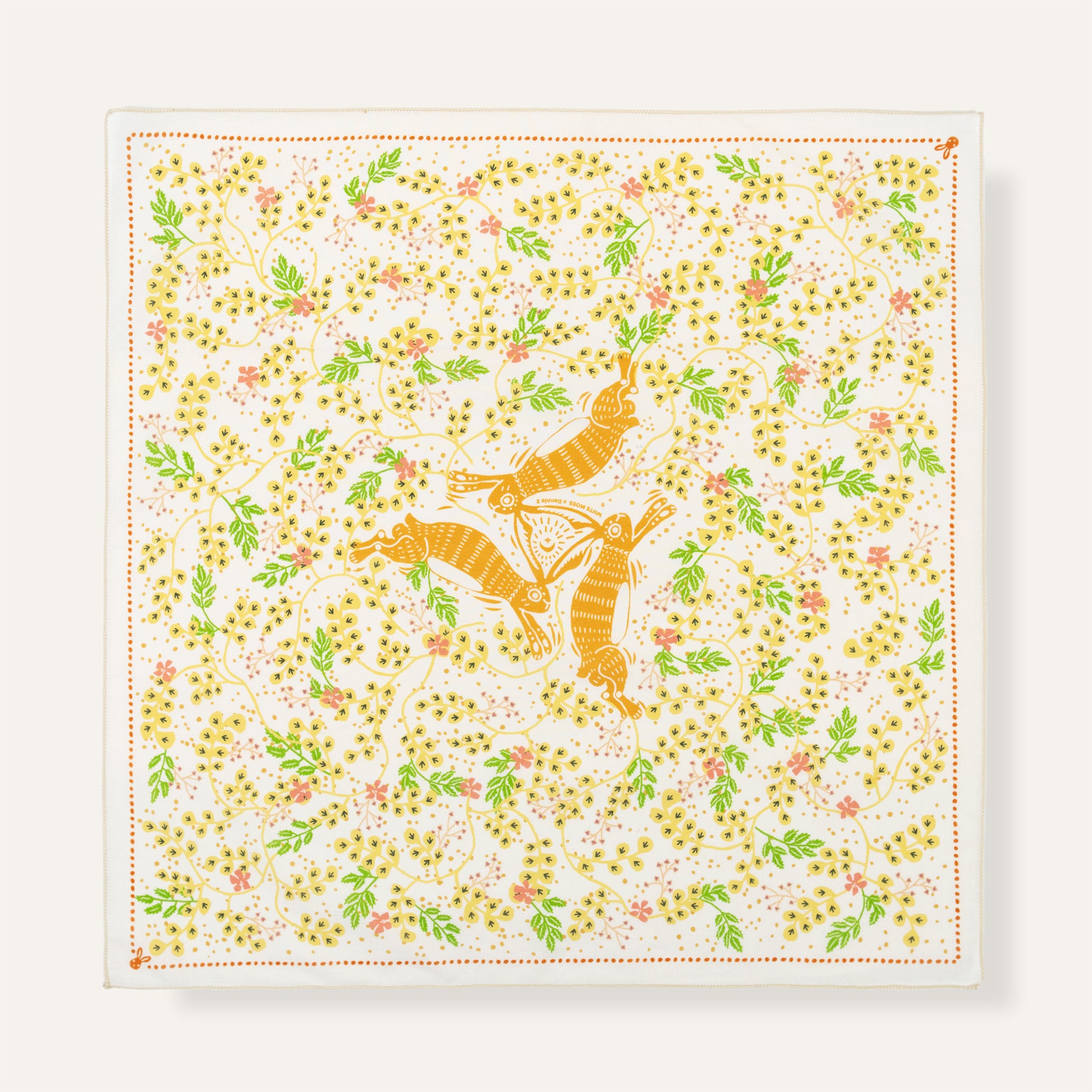 Square scarf with orange fox and floral pattern on a white background