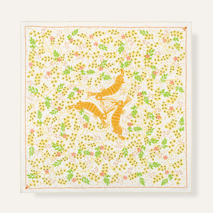 Square scarf with orange fox and floral pattern on a white background