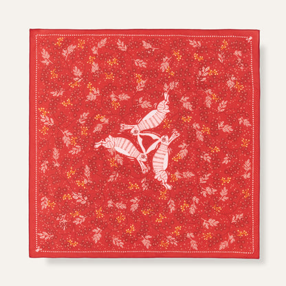 Red fabric with white rabbit pattern on a white background
