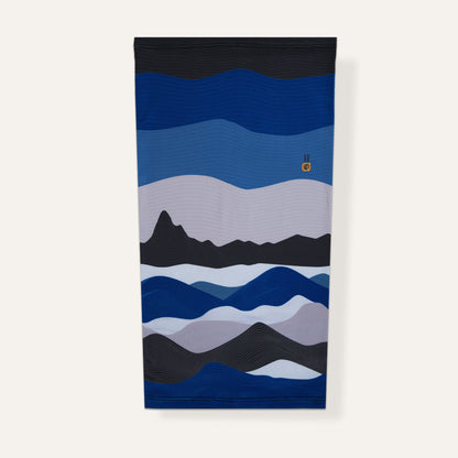 neck gaiter with wavy blue, black, and gray pattern on a white background