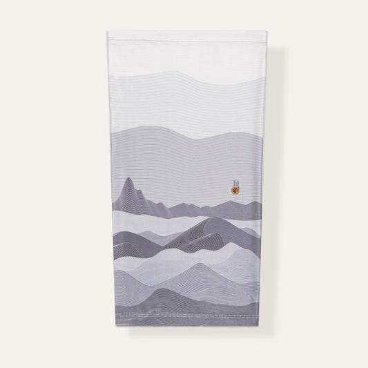 neck gaiter with mountain design on a white background