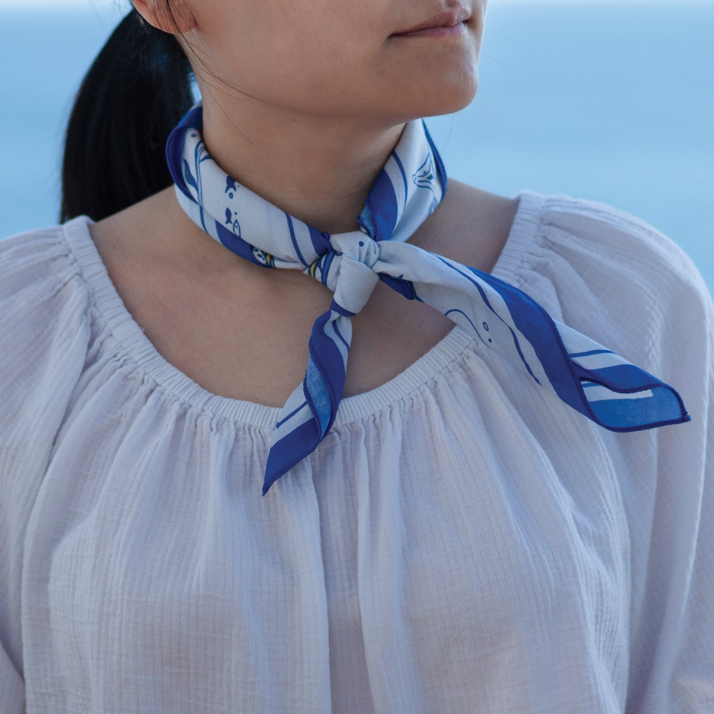 WHTE MOSS The Ocean Bandana | Light Blue - Flat lay arrangement of Breathable high-quality fabric. Perfect for hiking, campin